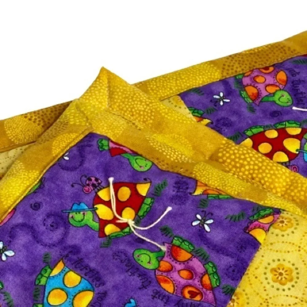 Handmade NWT turtle themed purple and gold baby or lap quilt size 43” X 38”